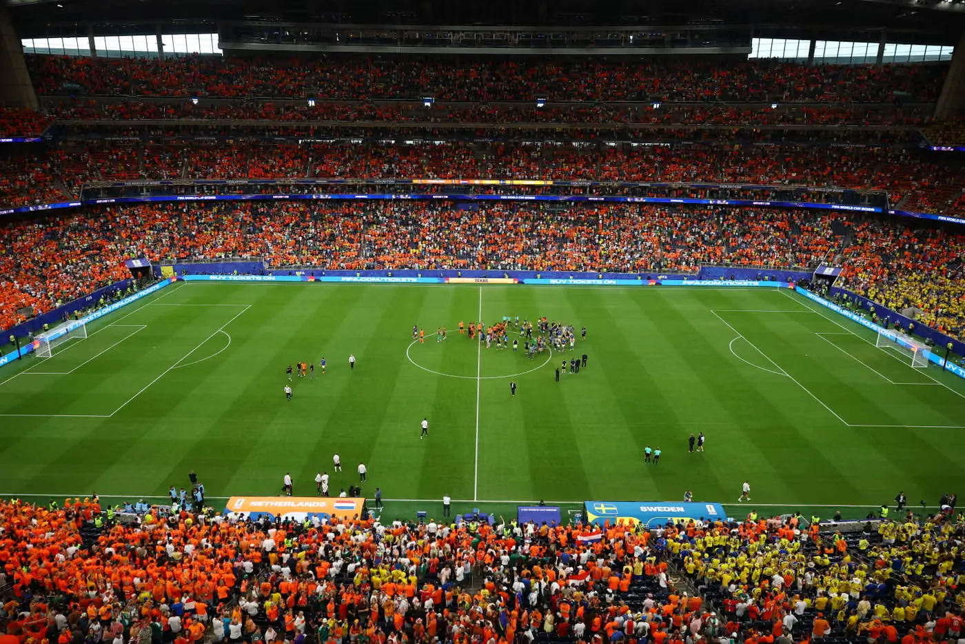 Netherlands players celebrate after the full-time whistle of their 5-1 win over Sweden at NRG Stadium, Houston